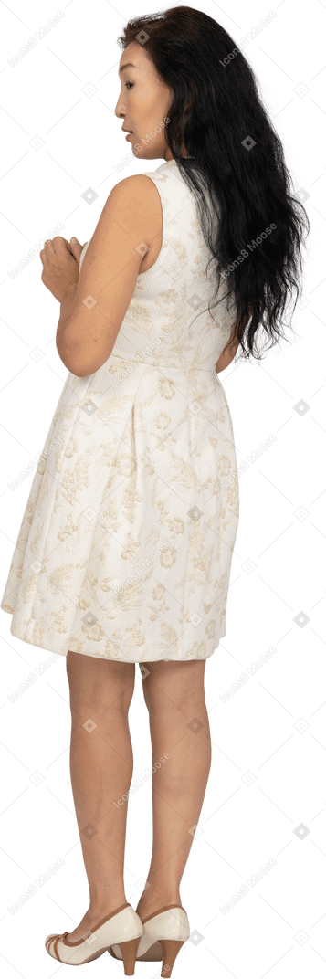 Woman in beautiful dress standing
