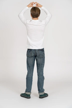 Young man in casual clothes standing