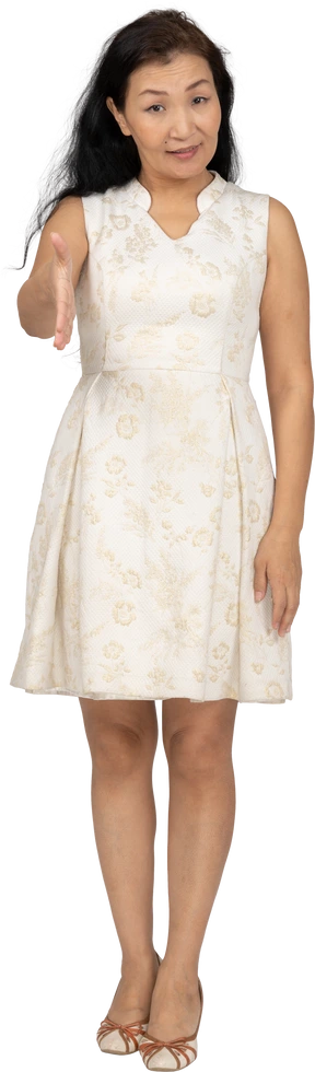 Woman in beautiful dress standing