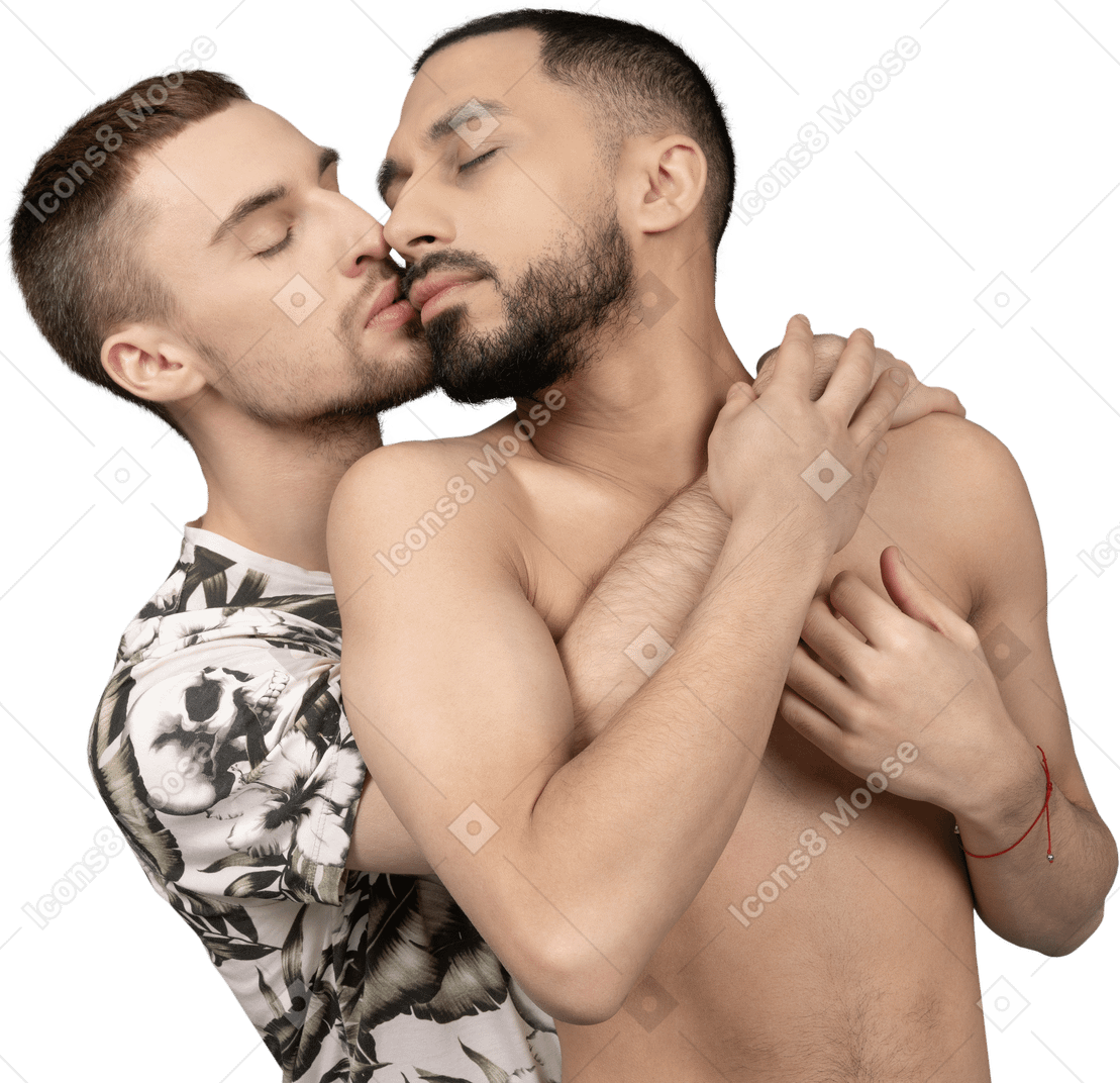 Close-up of a young man back hugging and kissing his shirtless lover