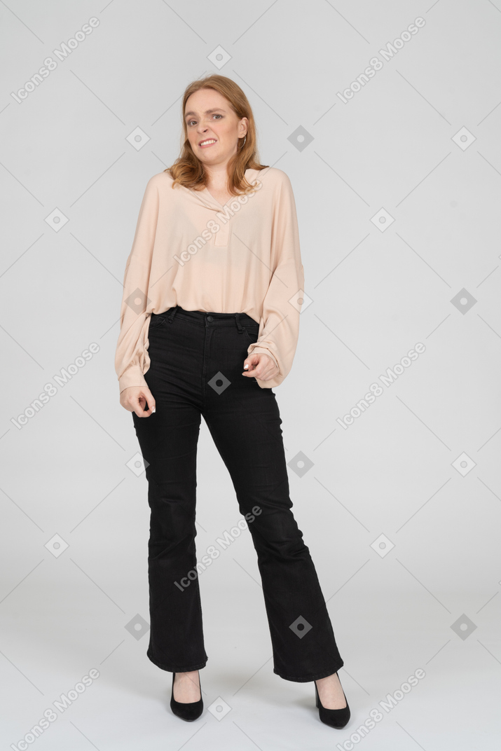 Woman in beautiful blouse standing