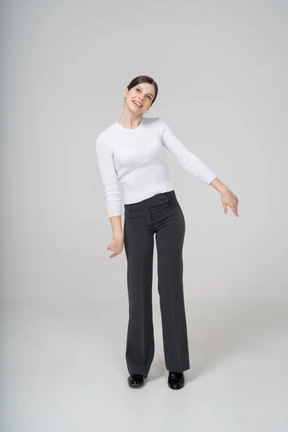 Front view of a happy woman looking at camera