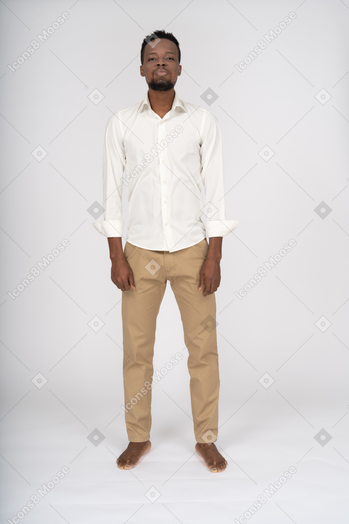 Man in white shirt standing