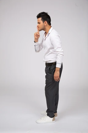Man in white shirt standing