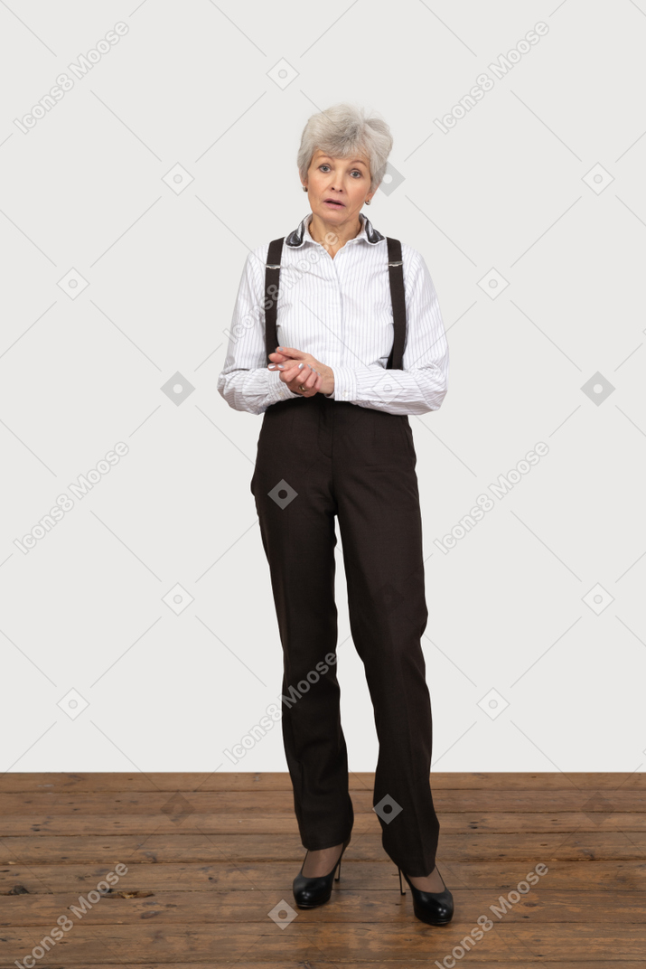 Surprised woman in formal clothes