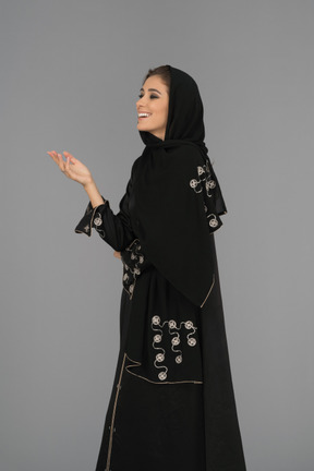 A cheerful muslim woman