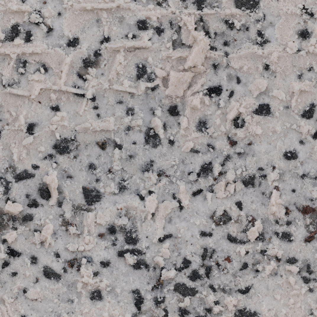 Snow layer with stone grains