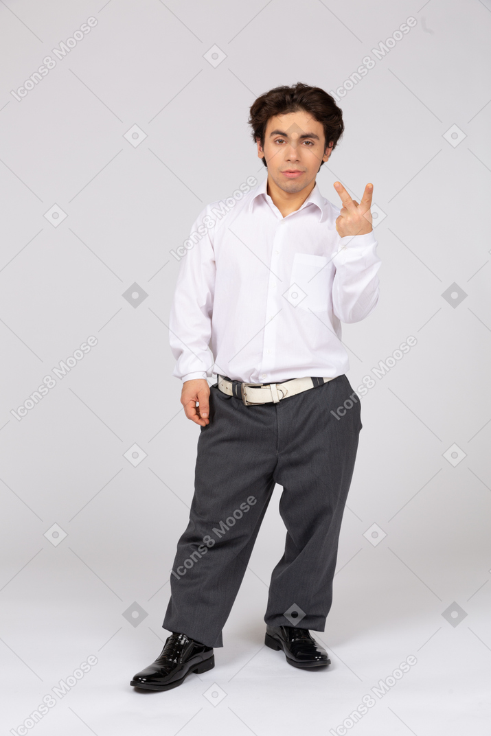 Employee showing a peace sign
