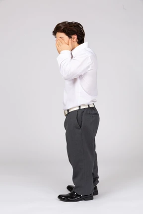 Man closing eyes with hands