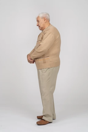 Side view of an old man in casual clothes