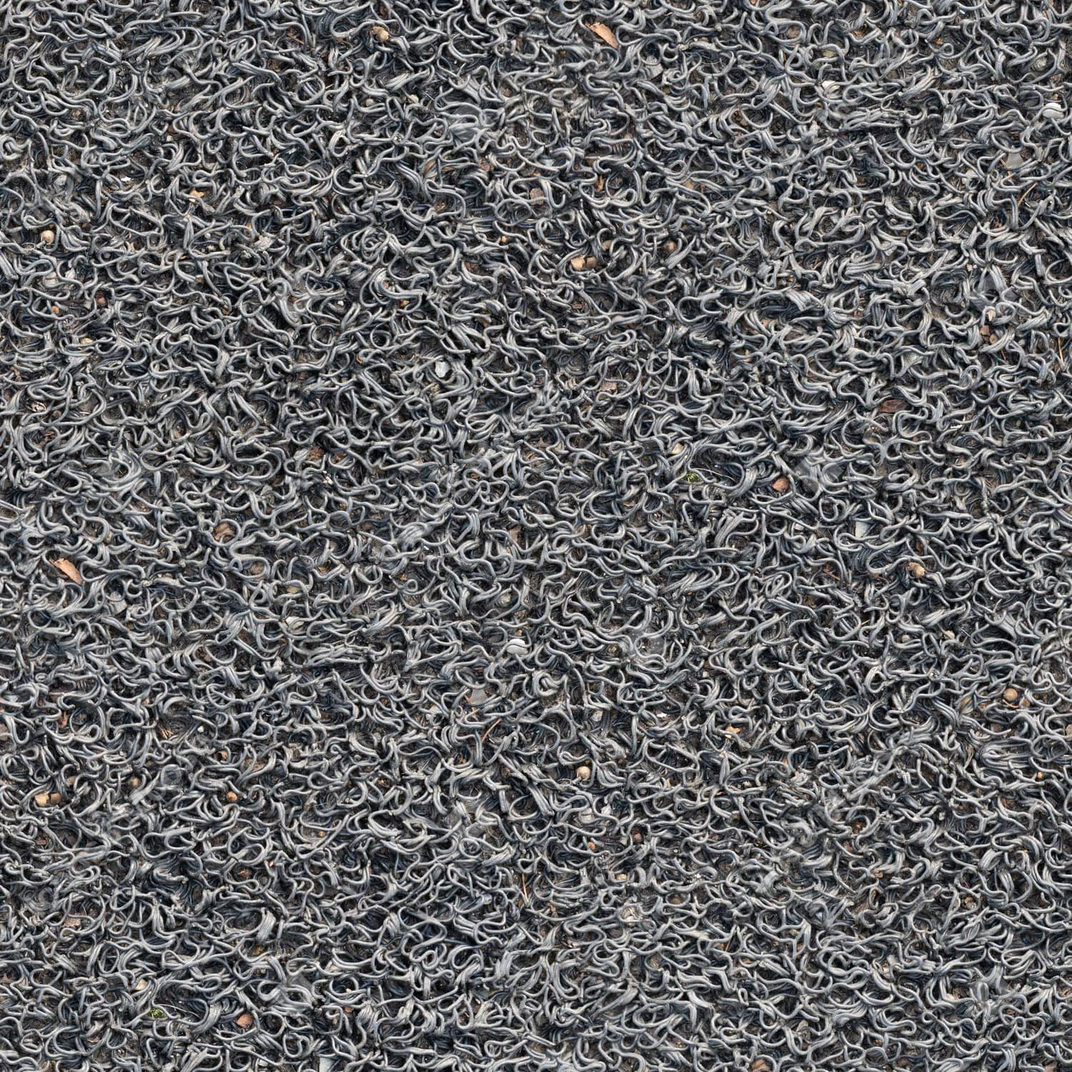 Ein nahaufnahmebild eines grauen metallnetzes