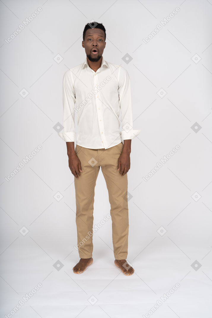 Man in white shirt standing