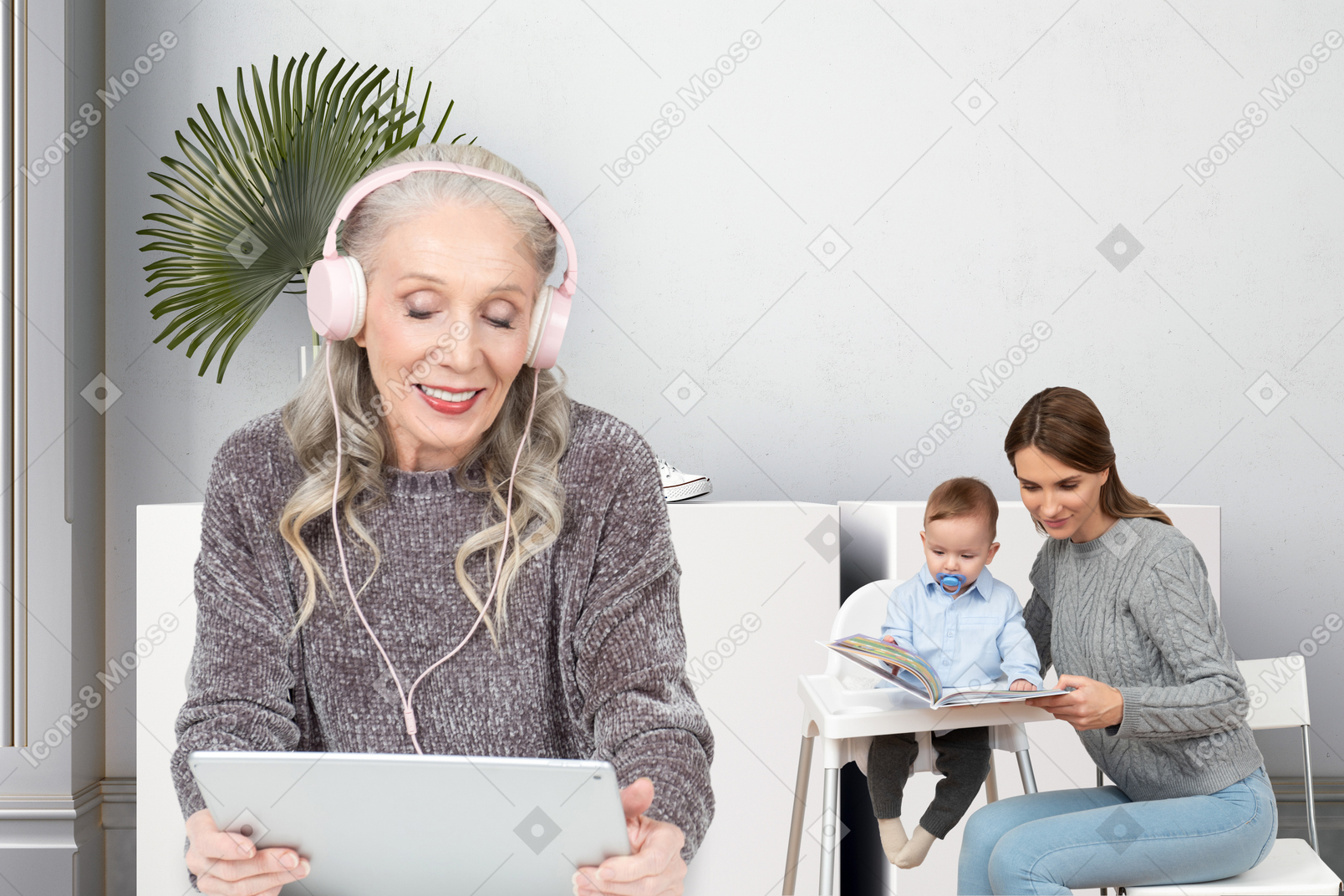 An elderly woman using a tablet while young woman reading a book to her baby