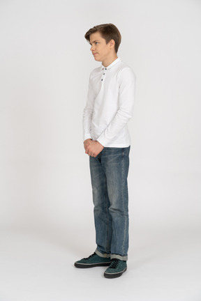 Young man in casual clothes standing