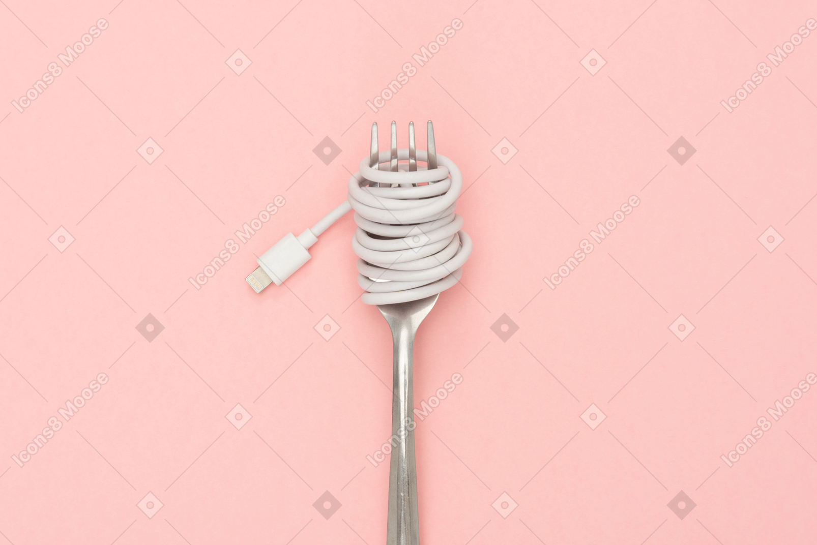Charger cable wrapped around a fork