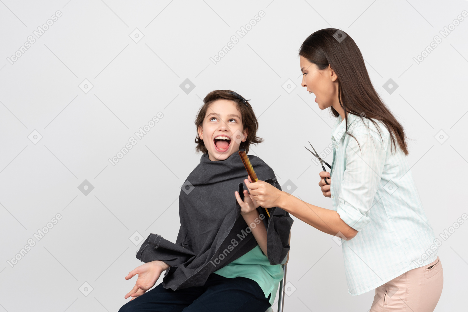 Angry hairdresser shouting at a young customer