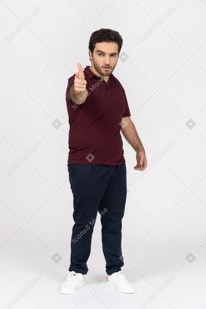 Man looking cool with a finger gun