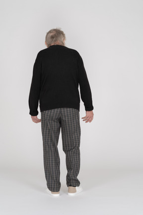 Back view of an elderly man