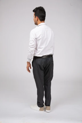 Man in white shirt standing