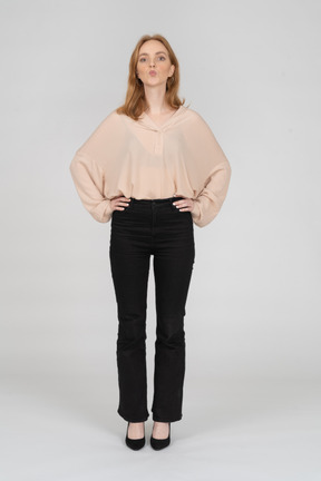 Woman in beautiful blouse standing