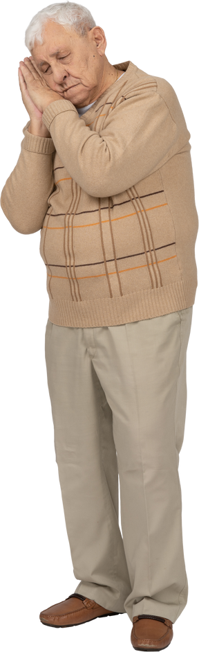 Front view of a sleepy old man in casual clothes