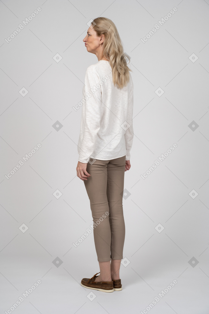 Woman in casual clothes standing