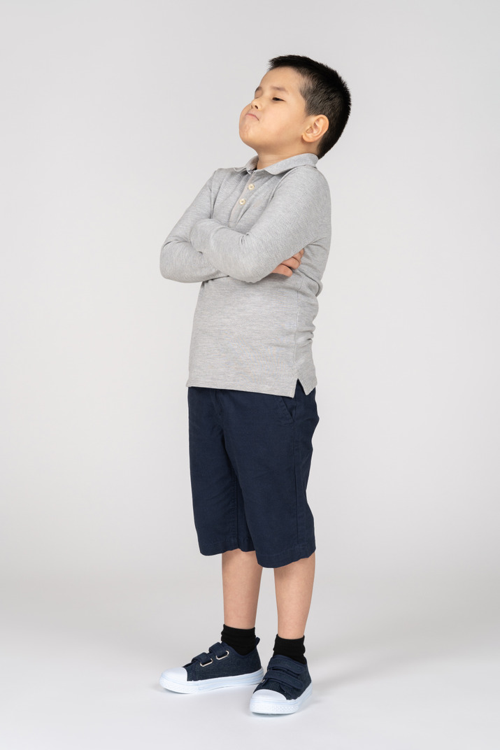 Boy with crossed arms