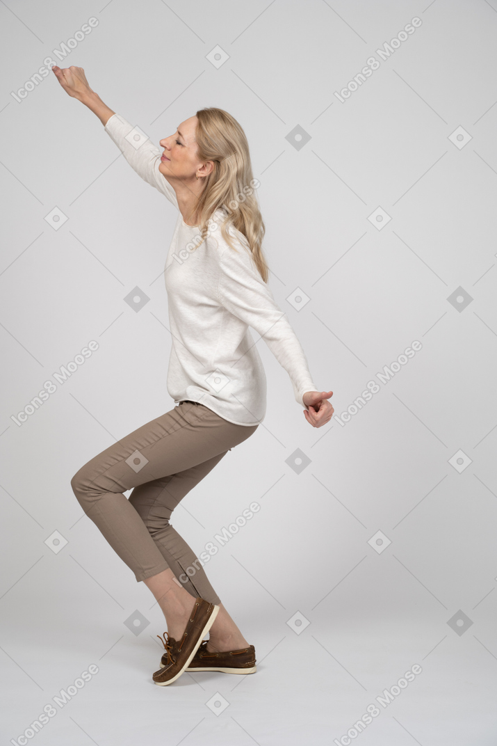 Woman in casual clothes posing