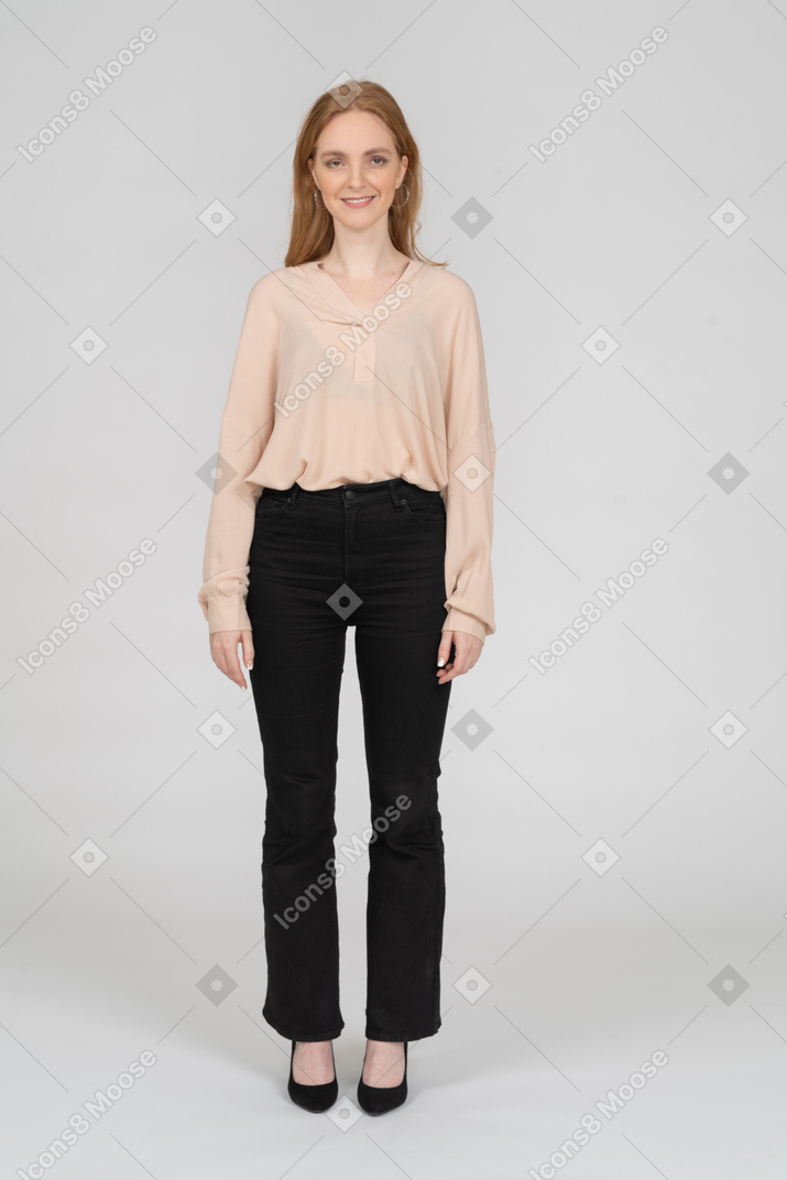 Woman in beautiful blouse standing