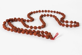 Mala beads on white background