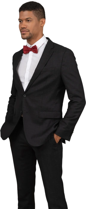 Man in black suit standing