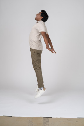 Man in casual clothes jumping