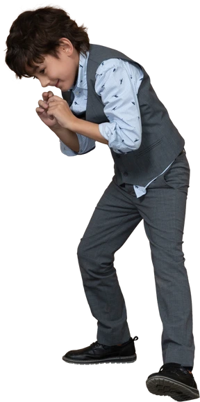 Front view of a boy in suit is ready to fight