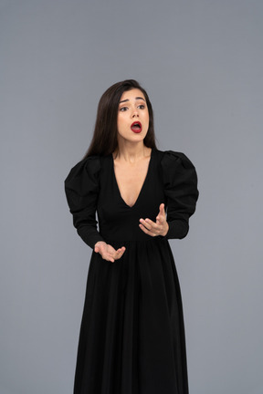 Front view of an opera female singer in black dress