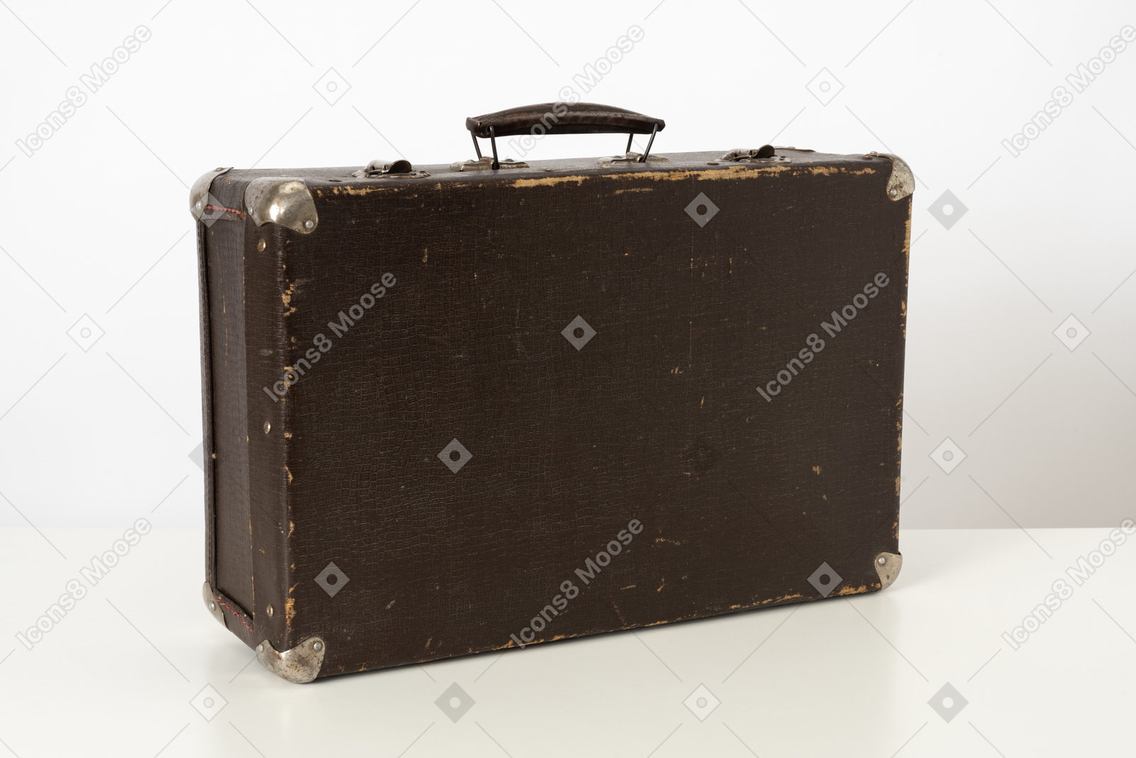 Old suitcase on a white background