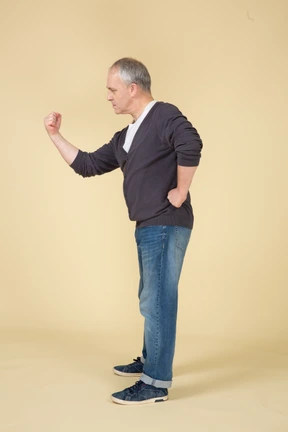 Man in casual clothes posing