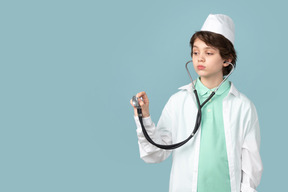 Attractive teenage in a doctor's outfit