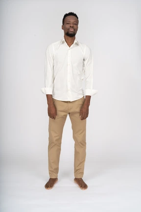 Man in white shirt standing