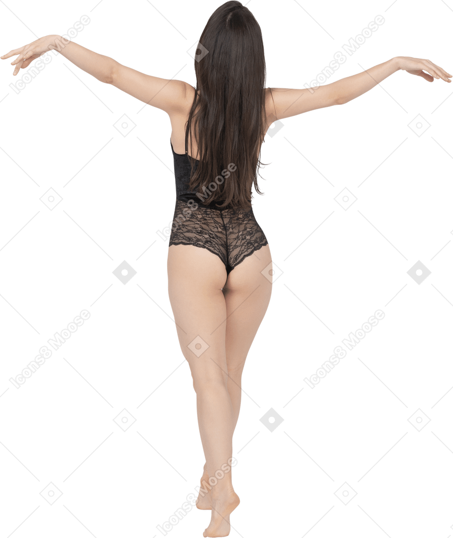 Sensual woman balancing on tiptoes