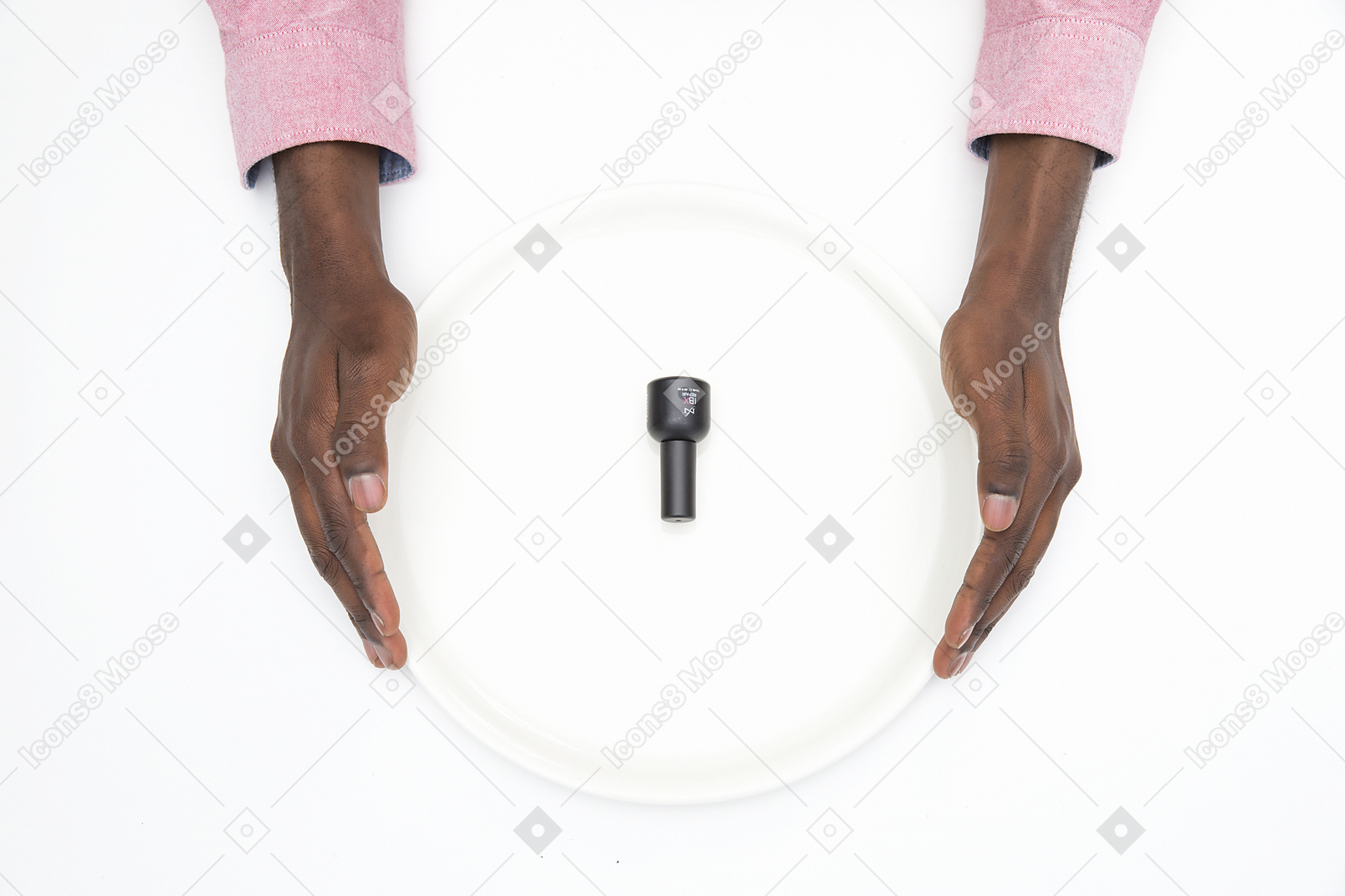 Black male hands holding white plate with nail polish on it