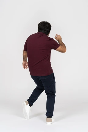 Back view of a man dancing