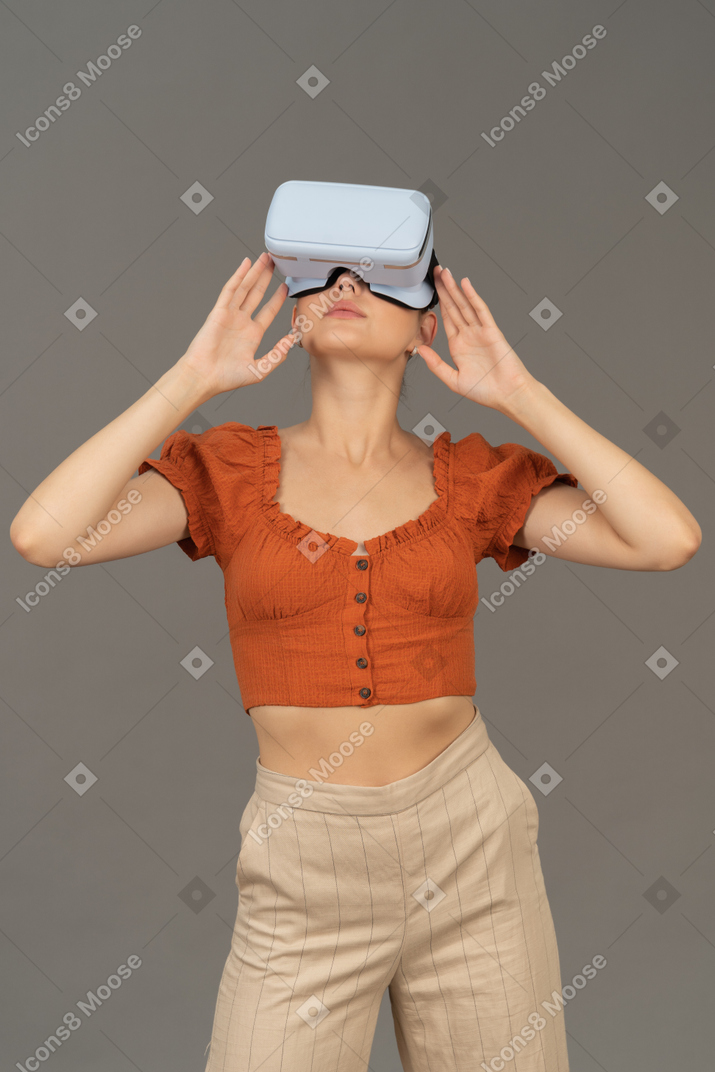 Front view of young woman in vr headset