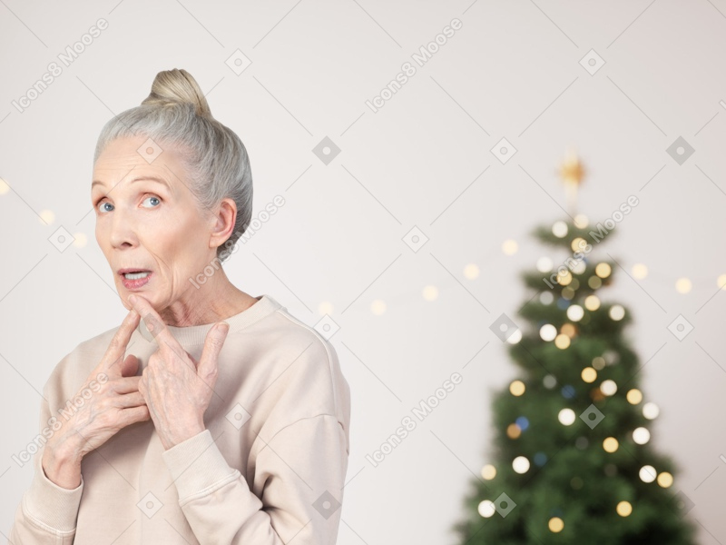 Old woman thinking about gifts from santa