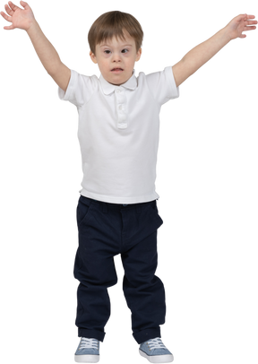 Front view of a boy standing with hands up