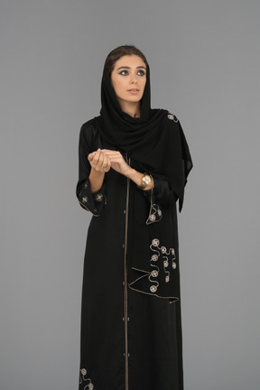 Young muslim woman looking sideways
