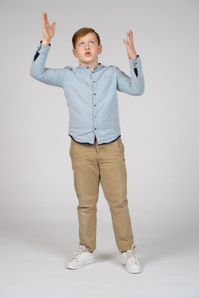 Young boy talking and gesturing