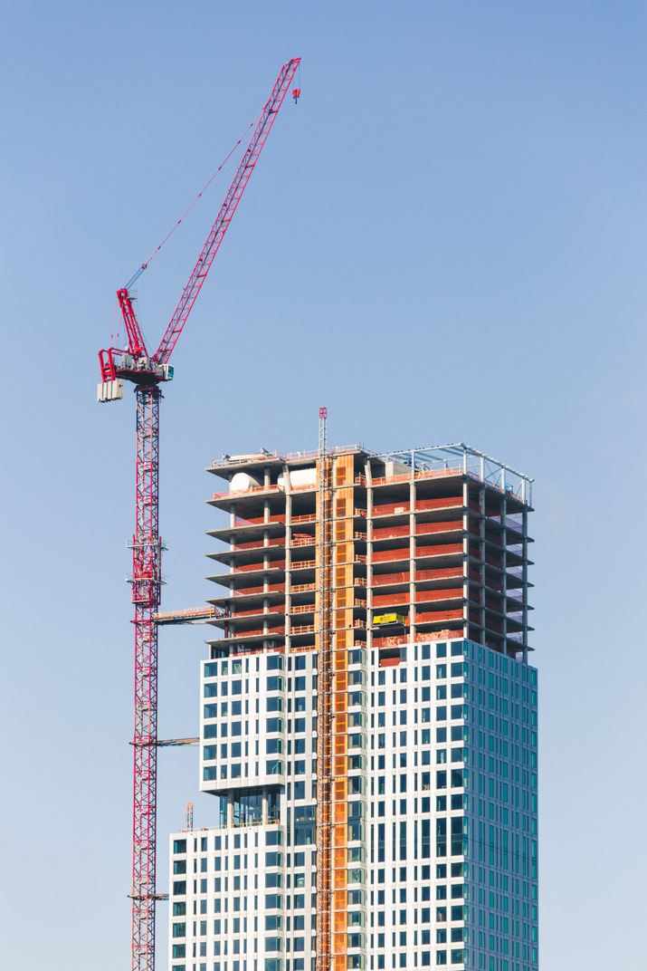 A construction crane and a building