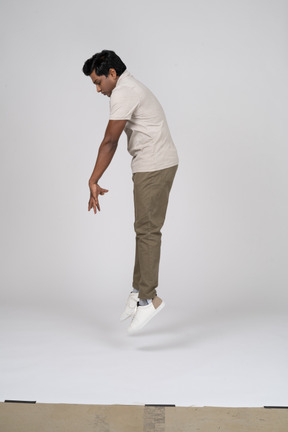 Man in casual clothes jumping