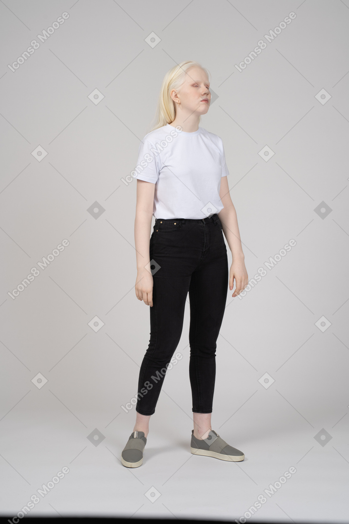 Three quarter view of girl standing