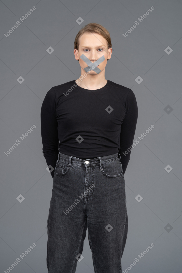 Person with duct tape on mouth and hands behind back